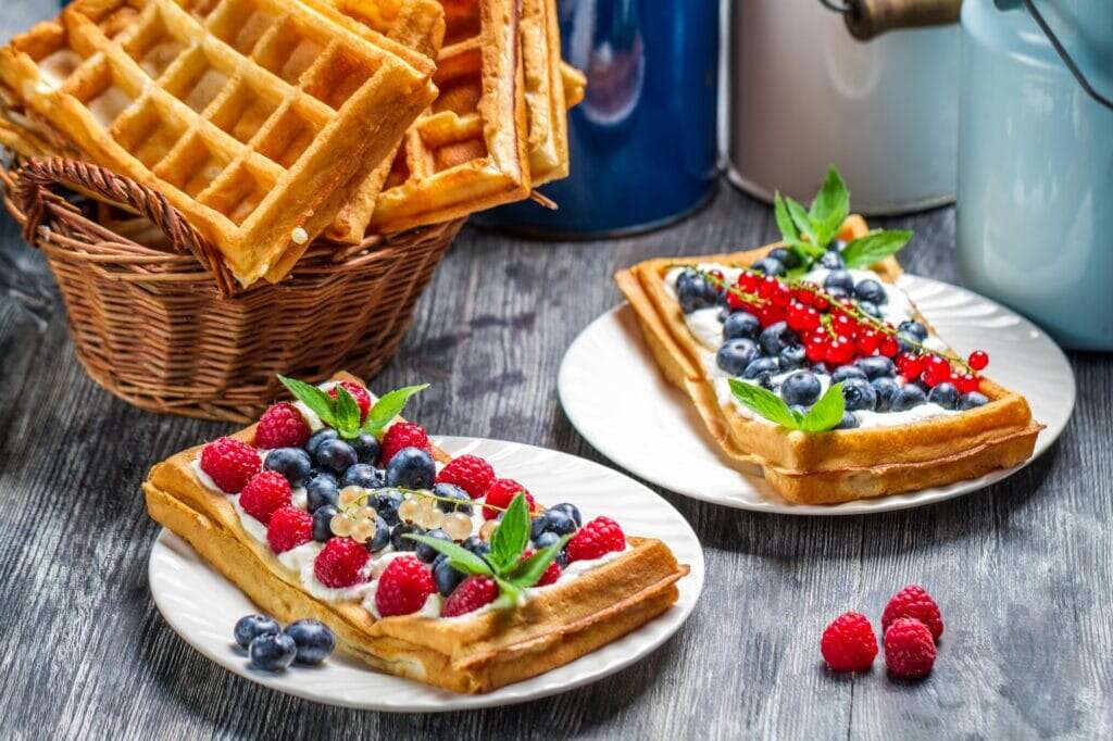 Waffles with fruit and whipped cream